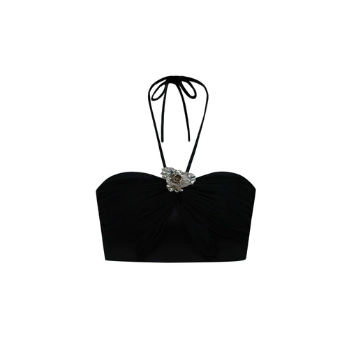 Black strapless top with decorative bow and silver embellishment on a white background