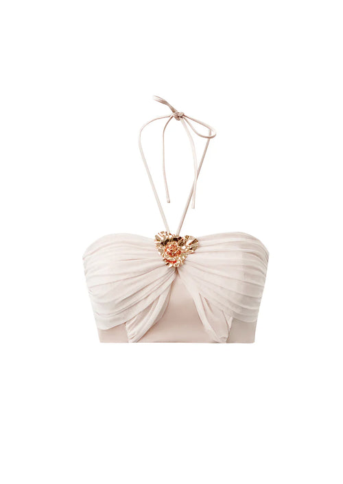 Product view of the Aveline pink bustier showcasing the blush pink hue, cloud-like ruching, and sculptural gold hardware.