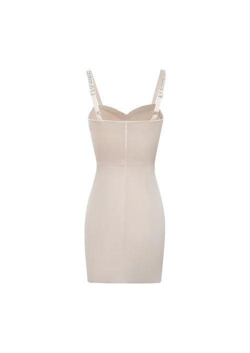 Product-only back view of the fitted pink dress, clearly displaying the seamless zipper closure and delicate strap construction