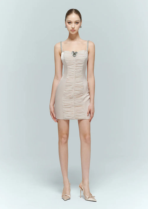 Full-length studio shot of the versatile pink evening dress, styled with classic pointed-toe heels for a sophisticated, minimalist aesthetic