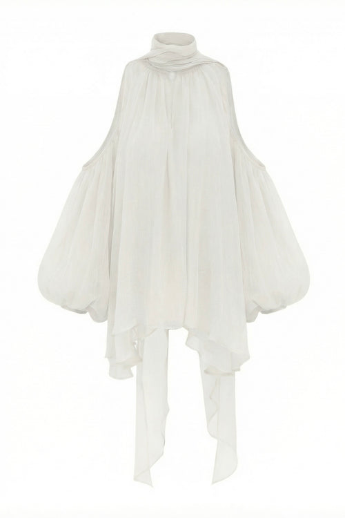 Aurorette White Tulle Top shown on a white background, highlighting the sheer texture and bias cut.