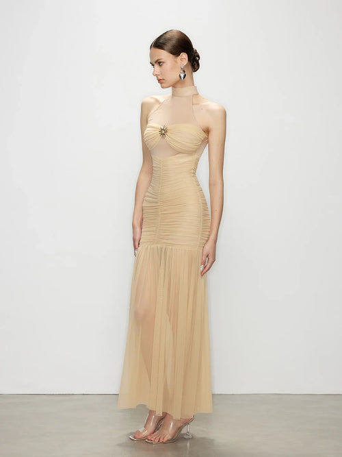 Three-quarter angle of the custom made dress, showcasing the sheer tulle overlay and elegant high neck formal dress design