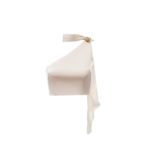 Front view of the Seraphine pink top garment, highlighting its unique construction and lustrous satin fabric compared to other pink one shoulder tops.