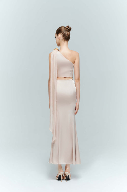 Full body back view of the Seraphine asymmetrical top, demonstrating the elegant length of the floor-sweeping cascading tulle train.