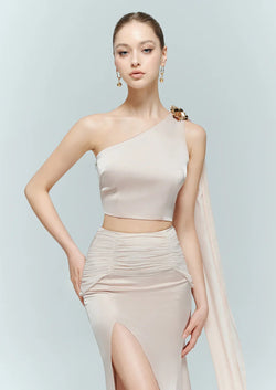 Model wearing the Seraphine designer crop top and Dahlia maxi skirt in pink, highlighting the minimalist elegant design and striking silhouette.