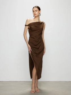 Front view of the Stellar chocolate brown dress. A minimalist elegant design by Artel Retro featuring an asymmetrical neckline and a bold high slit.