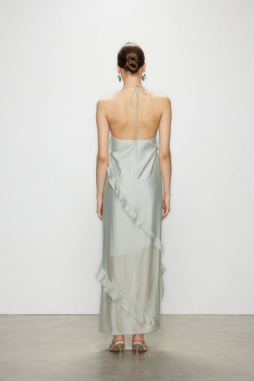 Back view of the Wavekiss high slit maxi dress in light blue, highlighting the delicate necktie and timeless open back design.